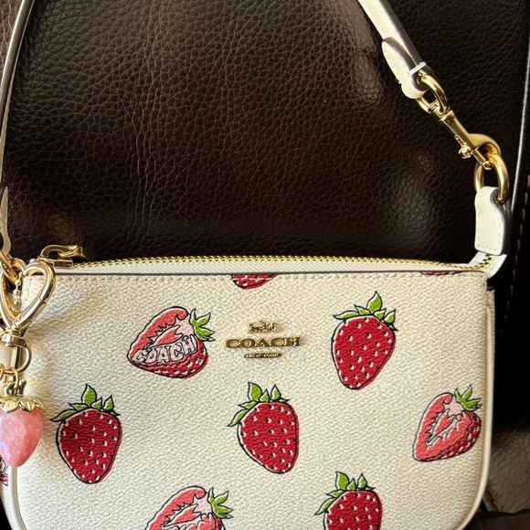 Coach Handbags - Coach nolita 19 Cream and Red Strawberry Print Clutch